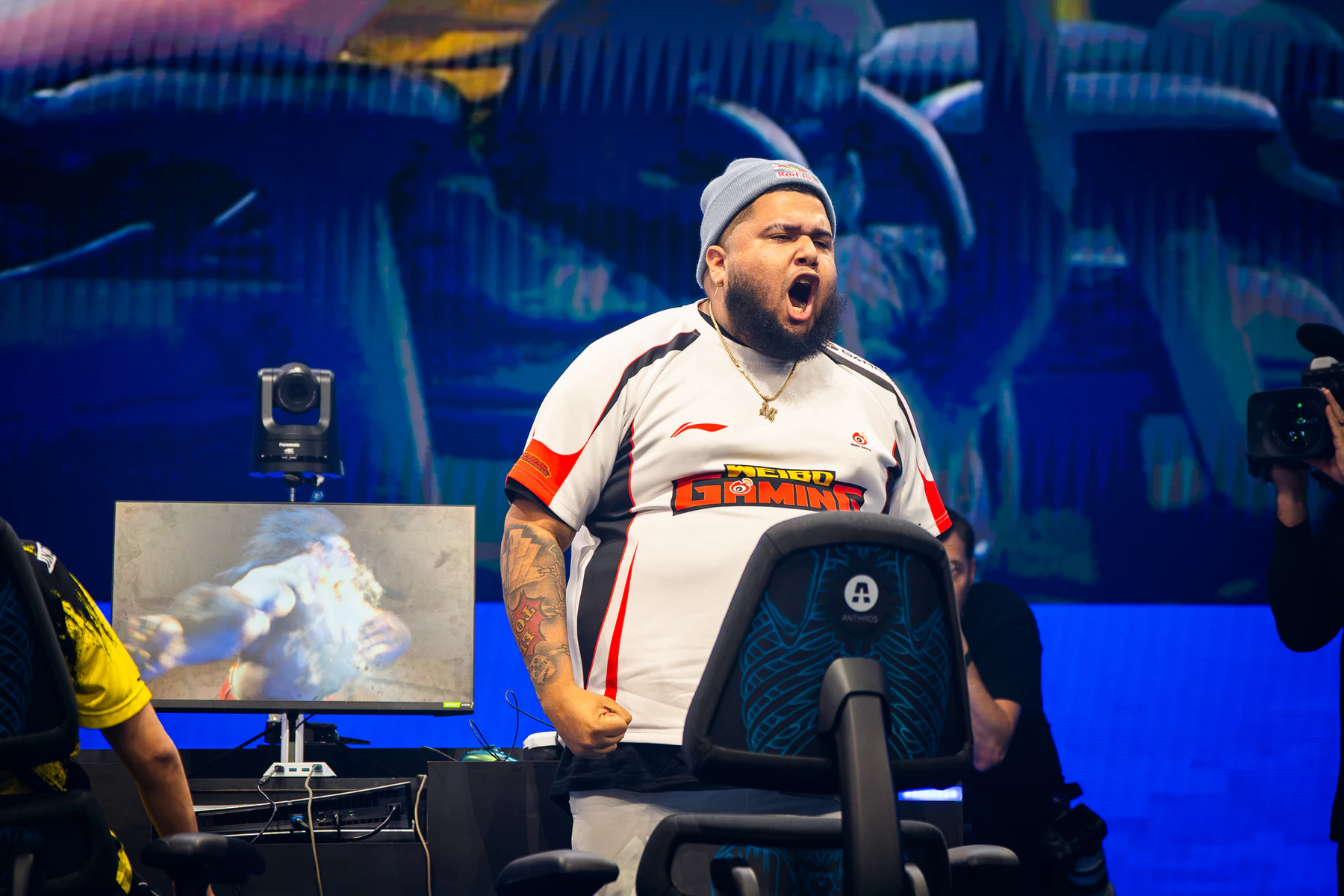 MenaRD reacting after a match on a professional Street Fighter stage